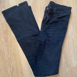 Black AE jeans with slit in the front of ankle. Good condition. Size 2.